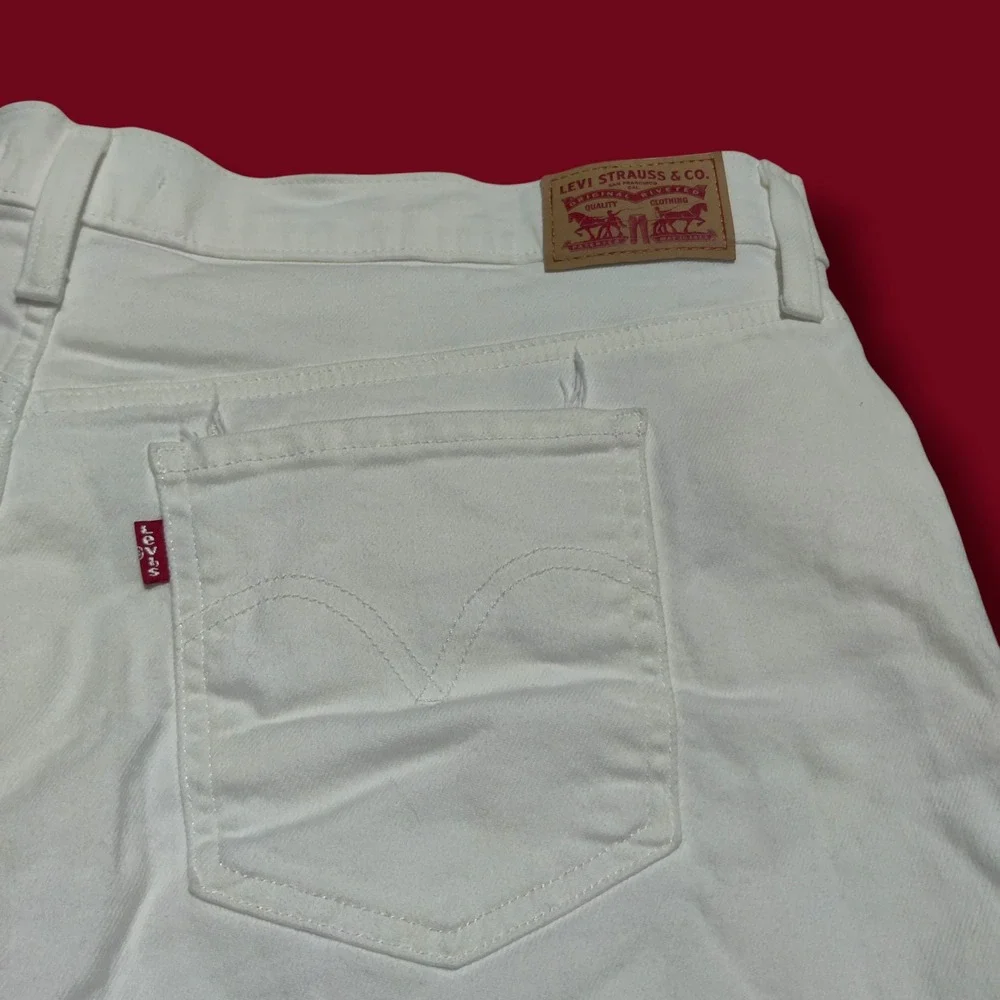 Levi's Mid Length‎ Shorts Womens 34 White Denim Cuffed Distressed Stretch New